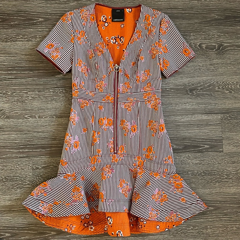 BUNKR Spring Collection. Embroider details with bell flare out.